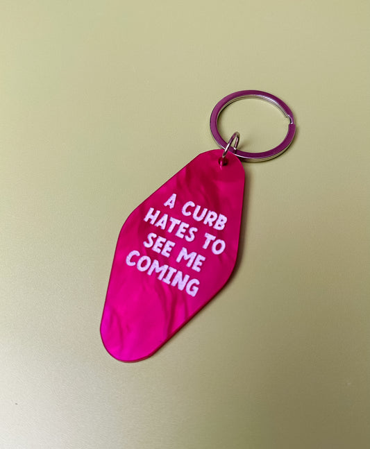 A Curb Hates to See Me Coming Keychain